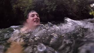 New Zealand, jumping in a river at Trout Pool falls, Okere Falls