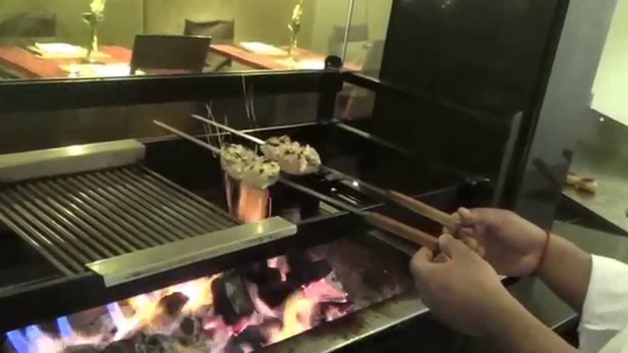 Cooking demo Mithas Edinburgh cooks wild smoked salmon smoked on the