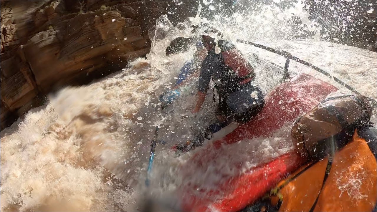 Surfing Upset Rapid on the Colorado River through the Grand Canyon - Boat Perspective
