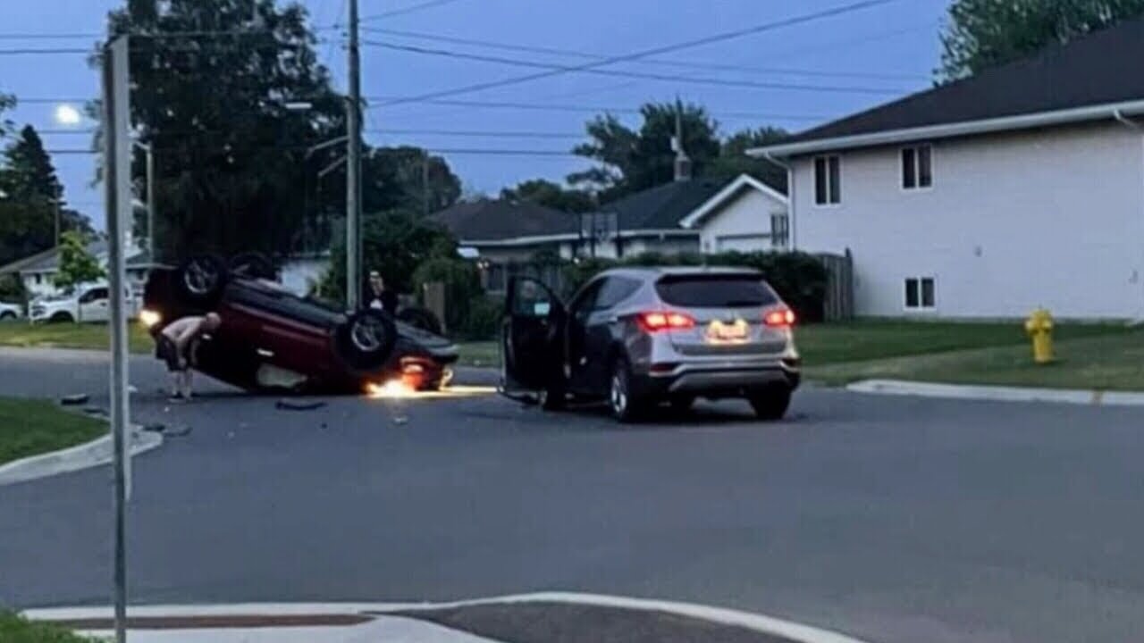 Driver walks away safely after car flips in crash - YouTube