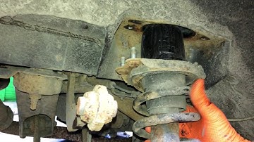 2006 Toyota Matrix AWD:  Removing and replacing the rear strut assemblies.