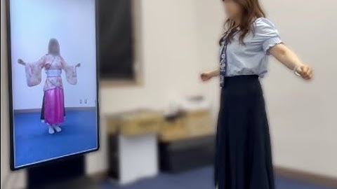 Real-Time Per-Garment Virtual Try-On with Temporal Consistency for Loose-Fitting Garments