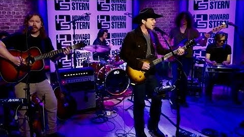 Lukas playing a four song set Howard Stern.