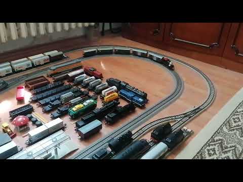 Parna lokomotiva modela 0-4-0 sa putnicko-teretnom kompozicijom svajcarskih zeleznica - HO