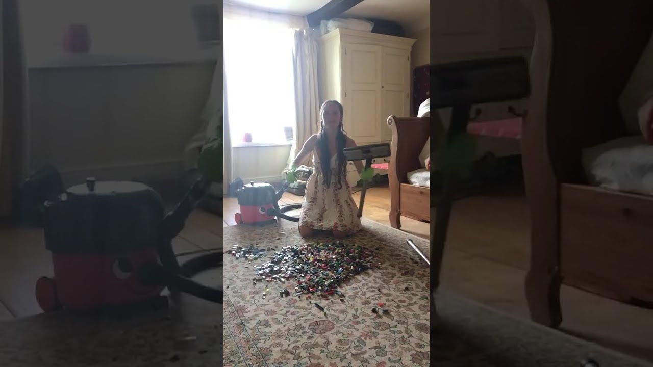 Lego with green gloves, vacuuming lego, leather gloves, feet, bin drop at the end