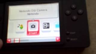 Nintendo DSi used Tested TWL-001 Flat Black has 7 Games loaded on it and Charger