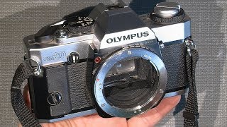 Stuck film advance lever in Olympus OM20