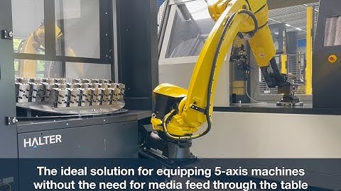 EMO 2023: Automatic loading of LANG Technik Makro•Grip® 5-Axis vises on a zero-point clamping system