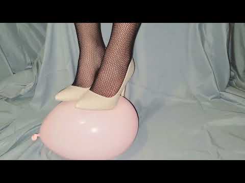 Nude heels, fishnet stockings and balloon play (no popping)