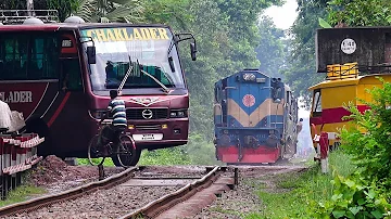 Train passing through a busy Rail Crossing/ Gate- Benapole Commuter of Bangladesh Railway