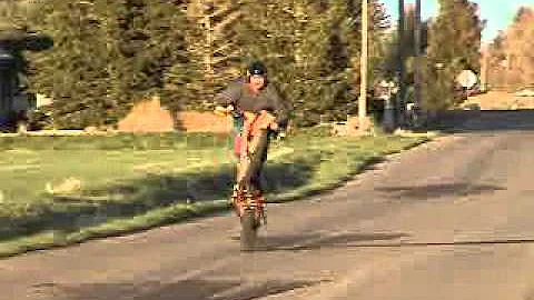 Wheelie Man Kelly Kraus Standing On Seat