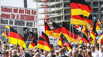 Thousands march in Berlin for and against far-right
