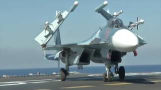 Su-33 Fighter Jets Take-offs with AA missiles from Admiral Kuznetsov Aircraft Carrier.