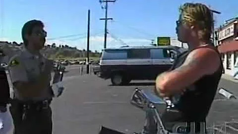 Cop pulls over Hell's Angel's  Biker