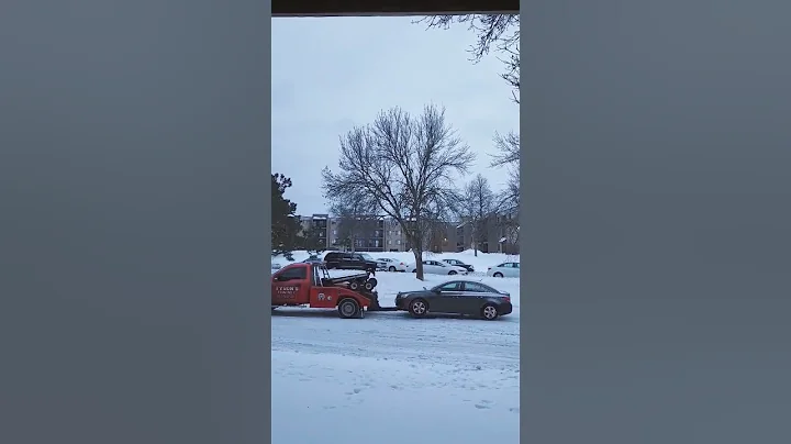 Efficient towing of vehicle to clean up snow #winter2022 #winter #minnesota #eagan #snowfall