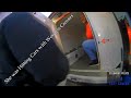 Woman Hitting Cars with Wooden Crosses