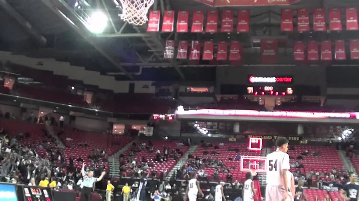 Largo's Derrick Colter hits full court shot at buz...