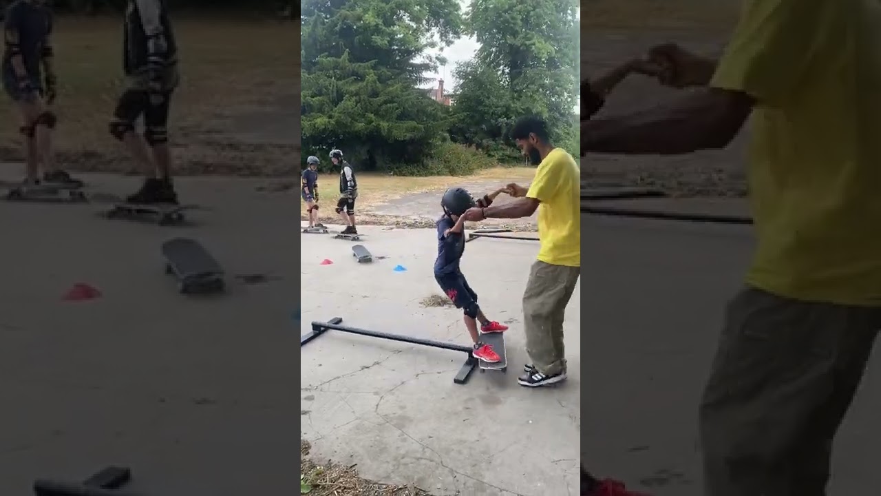 Coach Liam assisting Student Liam 