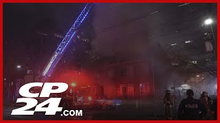 Firefighter injured after blaze spreads through three downtown homes