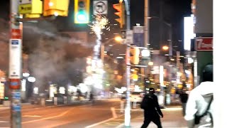 Video shows fireworks being lit on busy street in Toronto