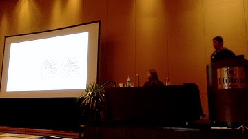 Feature Surfaces in Symmetric Tensor Fields Based on Eigenvalue Manifold