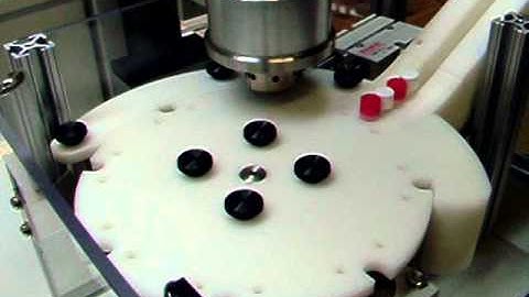 Fully automated bottle cap torque tester with starwheel