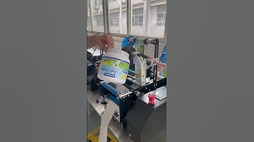 Semi-automatic round bottle labeling machine