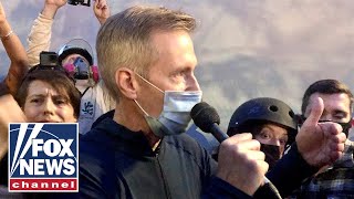 Portland mayor tear-gassed, shouted down during address to protesters