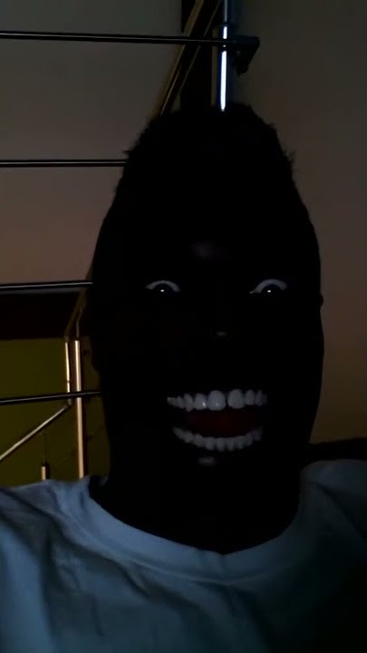 Black Man Laughing in the dark (meme)