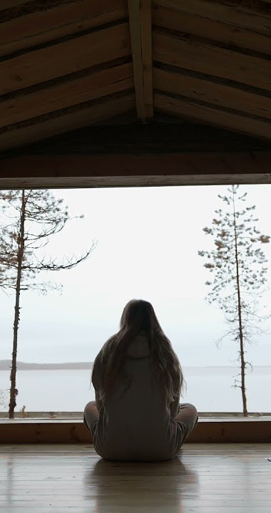 Woman Sitting on the Floor Watching Through the Window | Free Stock Video - No Copyright | 4K