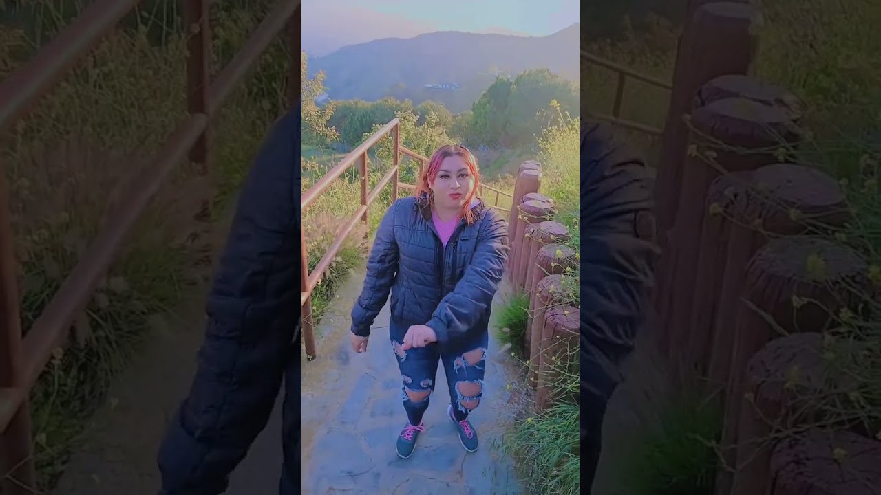 Woman Dancing to Latin Music on Outdoor Stairway