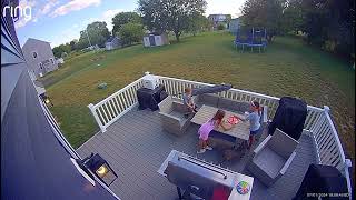 Boy walks on outdoor furniture then steps on arm of couch and faceplants into scorpion position