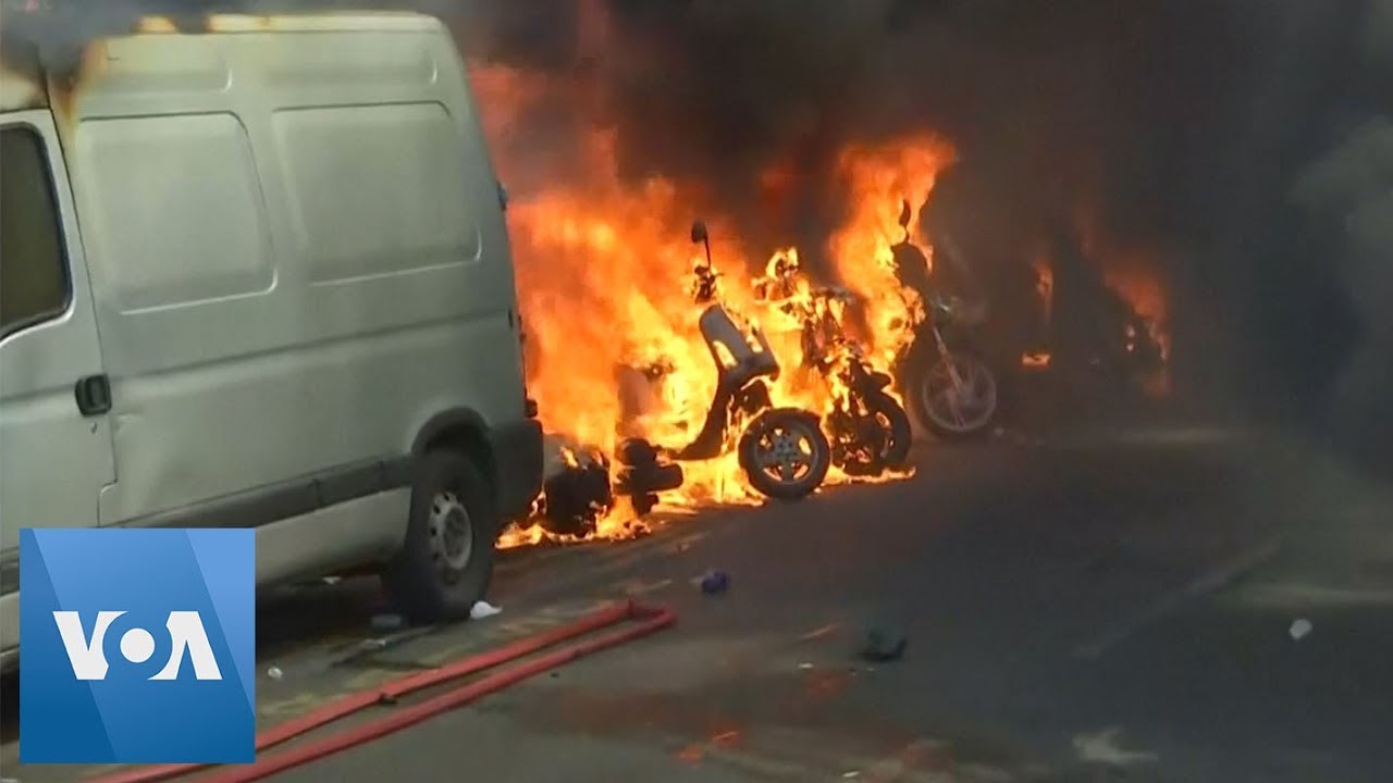 France: riot police use teargas to disperse Bastille Day protesters