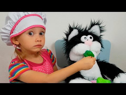 Alena plays with funny Toy Cat