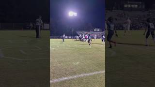 Nelson County’s Brody Clements hands the ball to Jackson Price who runs the ball in for a