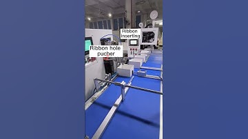 RP450B Auto ribbon hole punching and ribbon inserting machine