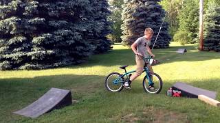 BMX jumping on plastic ramps