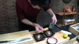 Japanese Master Lin prepares a sushi dish at Maison Asano