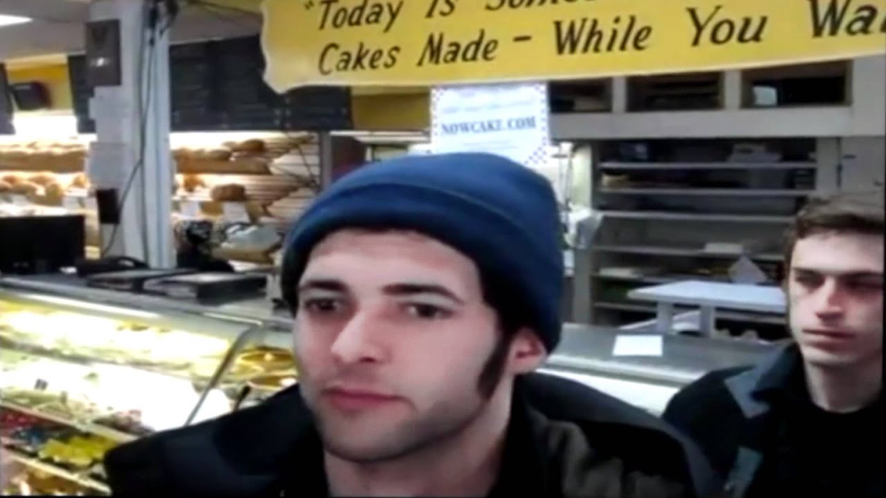 Protestors threaten historic Seattle bakery - YouTube