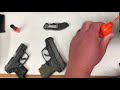 Painting plain black fixed front sights with blaze orange finger nail polish on my new Ruger pistols