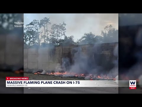 Moments after the plane crashes on I-75