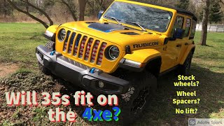 Will 35s fit on the new 2021 Jeep Wrangler 4xe? Do you need a lift? Spacers needed? Stock wheels?