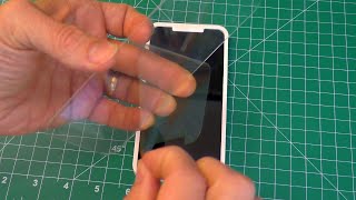 How to Install a Tempered Glass Screen Protector on your Phone (W/ Guide Frame)