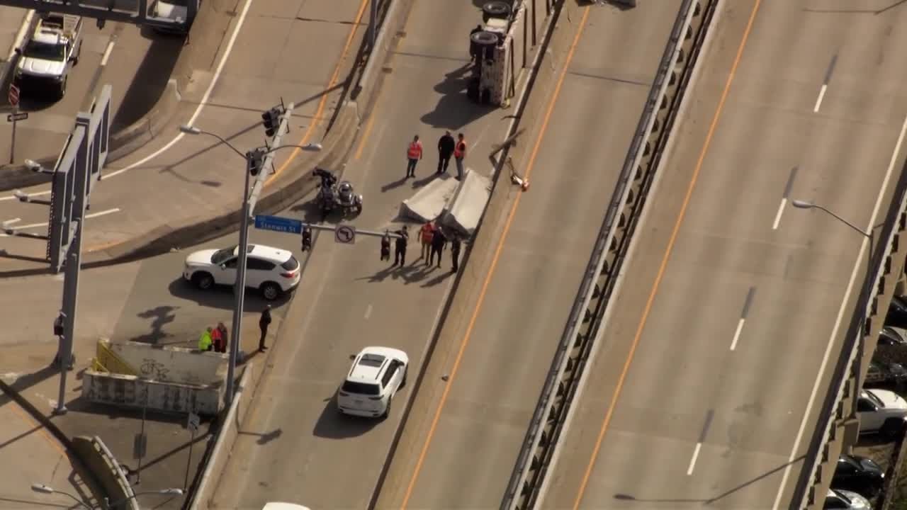 Tractor trailer overturns in downtown - YouTube