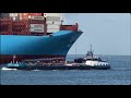 Maersk large container ship coming to the port  merchant ship arrival at port