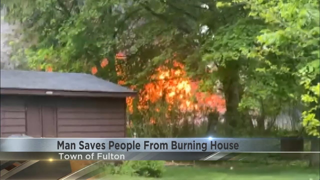 Man saves people from burning home in Town of Fulton fire - YouTube