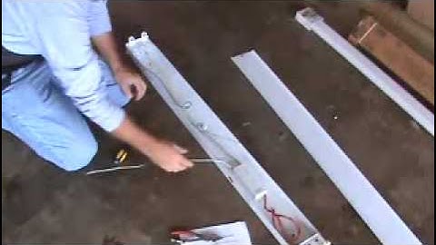 How to install a surface mounted fluorescent light fixture...Part 4