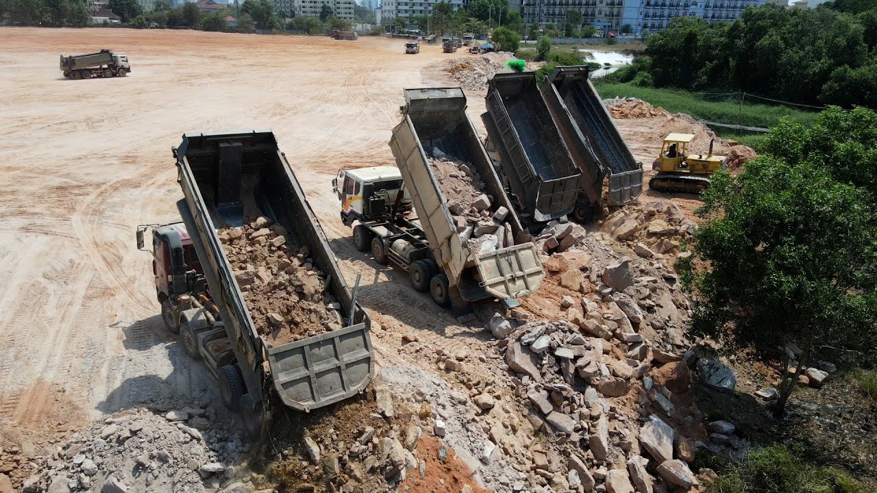 Large-scale landfill construction using dozer & advancing rock blend ...