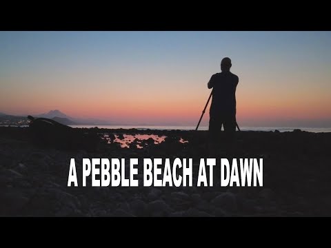 LANDSCAPE PHOTOGRAPHY ON A PEBBLE BEACH AT DAWN