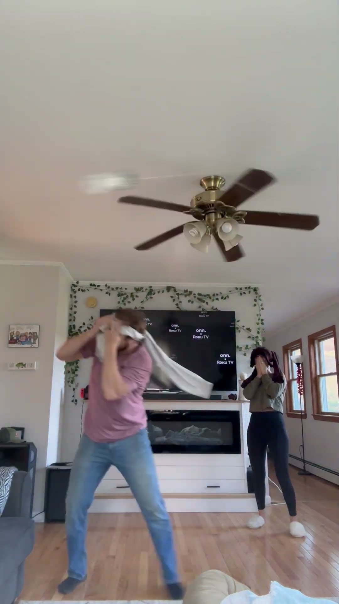 Couple’s Water Bottle Ceiling Fan Game Goes Hilariously Wrong